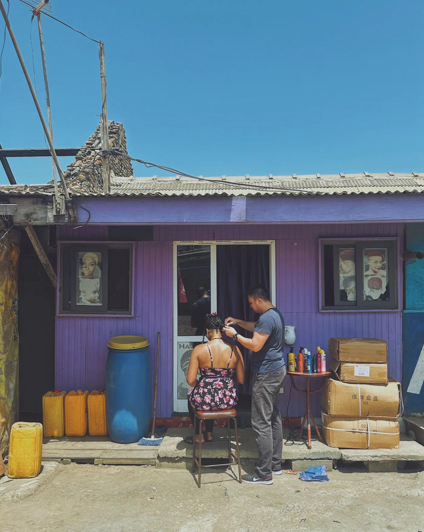 A roadside hair salon painted purple
